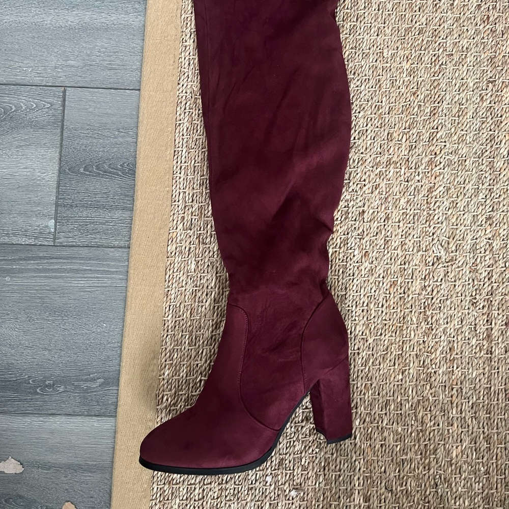 Thigh high burgundy heel boots